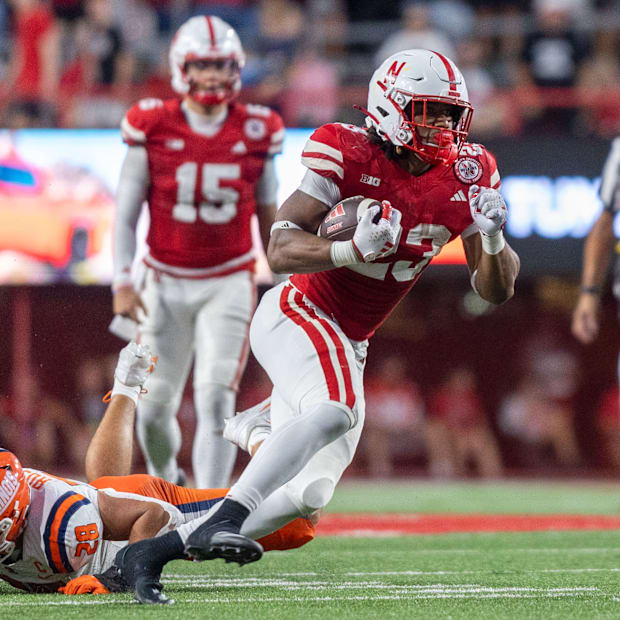 Nebraska running back Dante Dowdell gains four yards on a first quarter catch during Nebraska's 31-24 loss to Illinois.