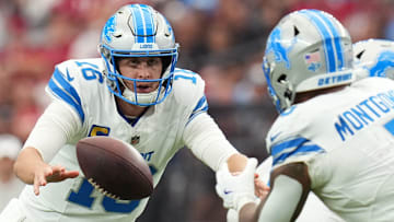 Detroit Lions quarterback Jared Goff (16) pitches the ball to running back David Montgomery (5) as they play the Arizona Cardinals at State Farm Stadium in Glendale, Ariz., on Sunday, Sept. 22, 2024.