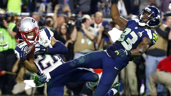 Feb 1, 2015; Glendale, AZ, USA; New England Patriots strong safety Malcolm Butler (21) intercepts a pass intended for Seattle Seahawks wide receiver Ricardo Lockette (83) in the fourth quarter in Super Bowl XLIX at University of Phoenix Stadium.