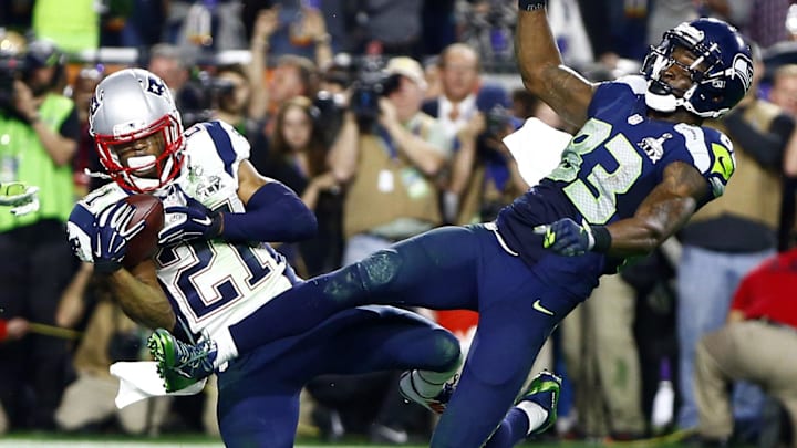 Feb 1, 2015; Glendale, AZ, USA; New England Patriots strong safety Malcolm Butler (21) intercepts a pass intended for Seattle Seahawks wide receiver Ricardo Lockette (83) in the fourth quarter in Super Bowl XLIX at University of Phoenix Stadium. Mandatory Credit: Mark J. Rebilas-Imagn Images