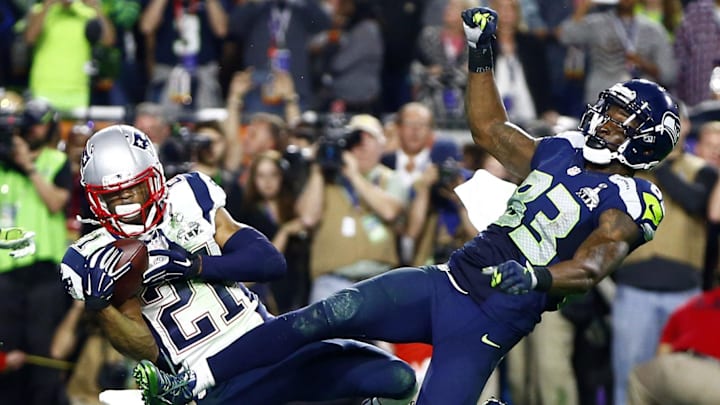 Feb 1, 2015; Glendale, AZ, USA; New England Patriots strong safety Malcolm Butler (21) intercepts a pass intended for Seattle Seahawks wide receiver Ricardo Lockette (83) in the fourth quarter in Super Bowl XLIX at University of Phoenix Stadium. Mandatory Credit: Mark J. Rebilas-Imagn Images