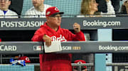 Cincinnati Reds manager Terry Francona looks on from the dugout in the seventh inning of the MLB National League Wild Card Game 1 between the Los Angeles Dodgers and the Cincinnati Reds at Dodger Stadium in Los Angeles on Tuesday, Sept. 30, 2025. The Dodgers won game 1 of the series, 10-5.
