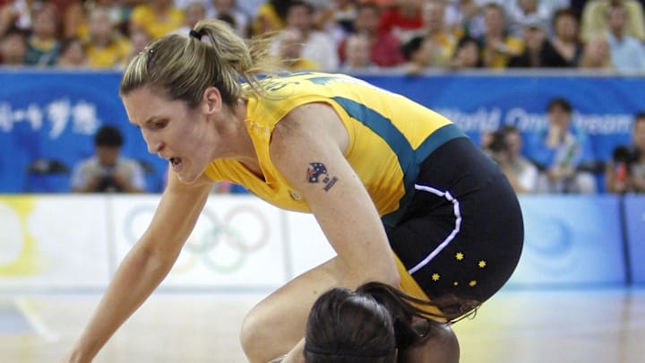Aug 23, 2008; Beijing, CHINA; USA center Lisa Leslie (bottom) dives for a loose ball against Australia forward Belinda Snell (top) during the womens basketball gold medal basketball game at the Beijing Olympic Basketball Gymnasium during the 2008 Beijing Olympic Games. Mandatory Credit: Jerry Lai-Imagn Images Aug 23, 2008; Beijing, CHINA; USA center Lisa Leslie (bottom) dives for a loose ball against Australia forward Belinda Snell (top) during the womens basketball gold medal basketball game at the Beijing Olympic Basketball Gymnasium during the 2008 Beijing Olympic Games. Mandatory Credit: Jerry Lai-Imagn Images