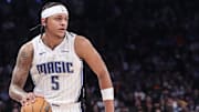 Mar 8, 2024; New York, New York, USA;  Orlando Magic forward Paolo Banchero (5) looks to drive to the basket in the first quarter against the New York Knicks at Madison Square Garden. Mandatory Credit: Wendell Cruz-Imagn Images