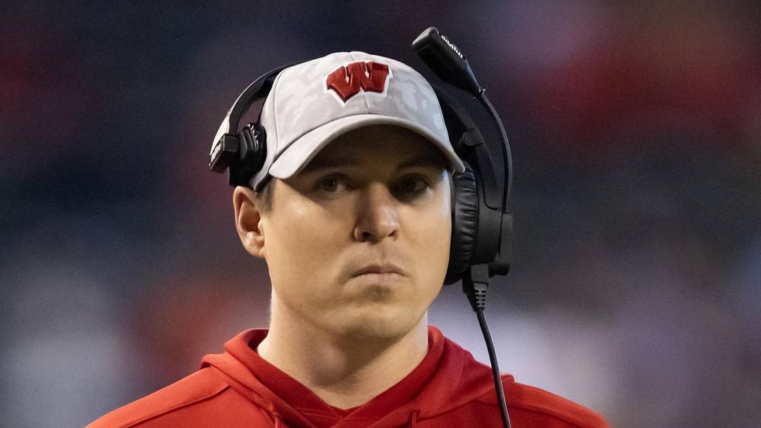 Dec 27, 2022; Phoenix, Arizona, USA; Wisconsin Badgers defensive coordinator Jim Leonhard against the Oklahoma State Cowboys during the 2022 Guaranteed Rate Bowl at Chase Field. Mandatory Credit: Mark J. Rebilas-Imagn Images