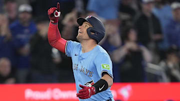 Mar 30, 2025; Toronto, Ontario, CAN; Toronto Blue Jays catcher Tyler Heineman (55) reacts as he runs to home plate after hitting a solo home run against the Baltimore Orioles during the seventh inning at Rogers Centre. Mandatory Credit: John E. Sokolowski-Imagn Images
