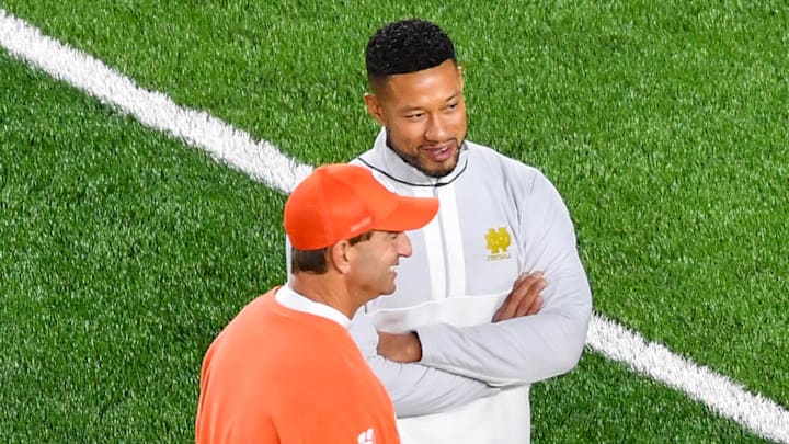 Nov 5, 2022; South Bend, Indiana, USA; Clemson Tigers head coach Dabo Swinney and Notre Dame Fighting Irish head coach Marcus Freeman talk before a game at Notre Dame Stadium. Nov 5, 2022; South Bend, Indiana, USA; Clemson Tigers head coach Dabo Swinney and Notre Dame Fighting Irish head coach Marcus Freeman talk before a game at Notre Dame Stadium.