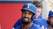 Oct 2, 2022; Anaheim, California, USA; Texas Rangers second baseman Marcus Semien (2) smiles in the dugout after scoring a home run by shortstop Corey Seager (5) in the fifth inning against the Los Angeles Angels at Angel Stadium. Mandatory Credit: Kiyoshi Mio-Imagn Images