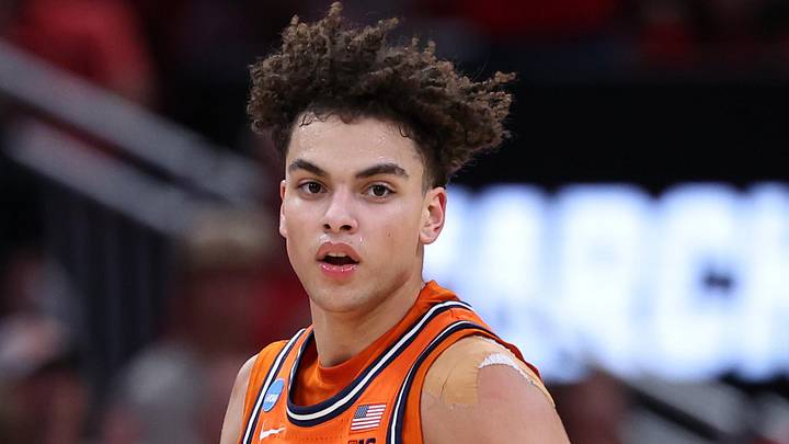 Illinois Fighting Illini guard Keaton Wagler (23) dribbles the ball against the Houston Cougars in the 2026 NCAA Tournament at Toyota Center on March 26, 2026.