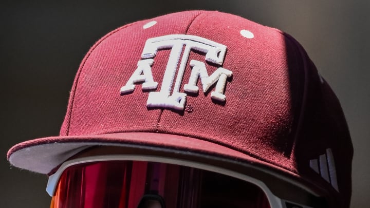 Jun 8, 2024; College Station, TX, USA; A detailed view of a Texas A&M baseball cap worn during the game against the Oregon at Olsen Field, Blue Bell Park.