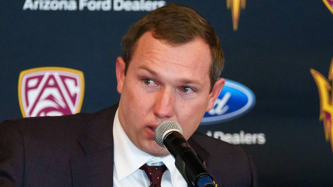 Kenny Dillingham is emotional as he speaks at a news conference, introducing him as ASU's new head football coach on Nov. 27, 2022, at Sun Devil Stadium in Tempe, AZ.