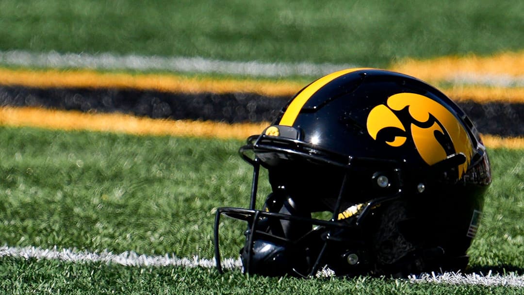 An Iowa Hawkeyes helmet lays on the field before a football game against the Indiana Hoosiers Sept. 27, 2025 at Kinnick Stadium in Iowa City, Iowa.