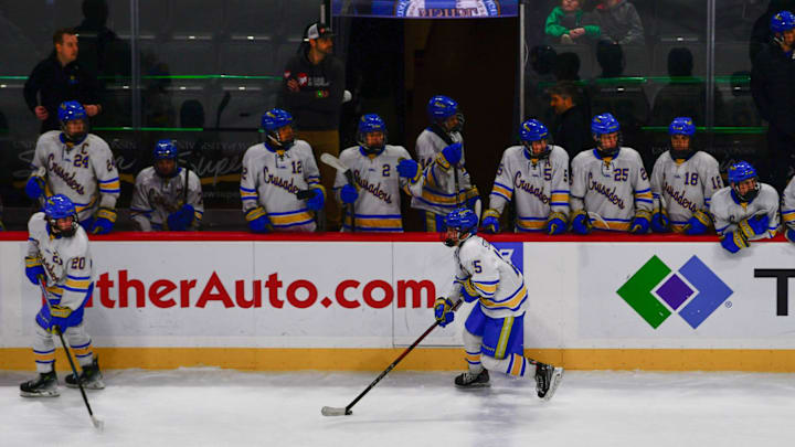 St. Cloud Cathedral hockey senior Connor Stockman carries the puck along his bench versus Orono in the semifinal of the Minnesota state hockey tournament March 7, 2025 at the Xcel Energy Center in St. Paul. The Crusaders advanced to the final with a 4-1 win. St. Cloud Cathedral hockey senior Connor Stockman carries the puck along his bench versus Orono in the semifinal of the Minnesota state hockey tournament March 7, 2025 at the Xcel Energy Center in St. Paul. The Crusaders advanced to the final with a 4-1 win.