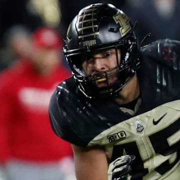 Purdue Boilermakers running back Devin Mockobee (45) rushes the ball 