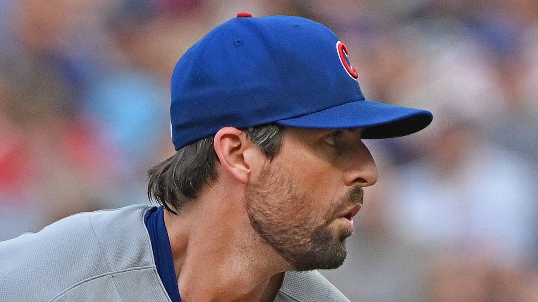Aug 8, 2026; Kansas City, Missouri, USA;  Chicago Cubs starting pitcher Clay Holmes (25) looks into home plate before throwing a pitch in the first inning against the Kansas City Royals at Kauffman Stadium. Mandatory Credit: Peter Aiken-Imagn Images