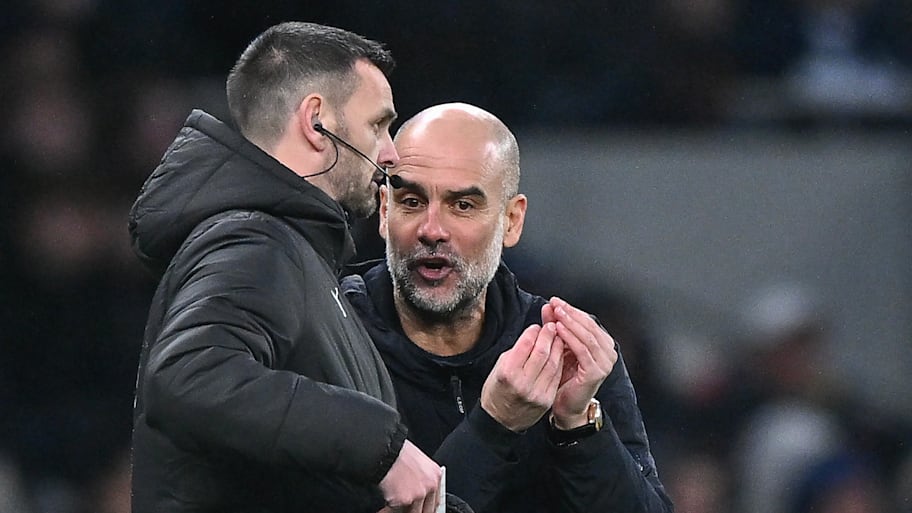 Pep Guardiola (right) shouting.