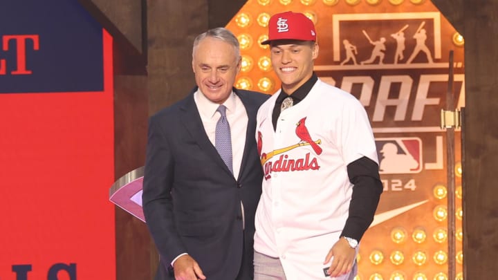 Jul 14, 2024; Ft. Worth, TX, USA;  JJ Wetherholt is congratulated by MLB commissioner Rob Manfred after being selected by the St. Louis Cardinals as the seventh player taken during the first round of the MLB Draft at Cowtown Coliseum. Mandatory Credit: Kevin Jairaj-USA TODAY Sports