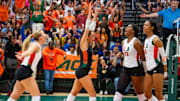 Miami Hurricanes Volleyball celebrating win over No. 4 Pitt