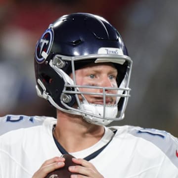 Former Tennessee Titans quarterback Tim Boyle (15) drops back to pass against the Tampa Bay Buccaneers during preseason