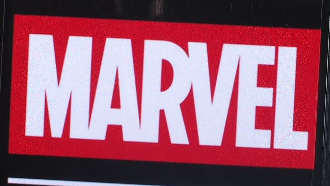 In this photo illustration, Marvel Entertainment logo seen...