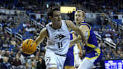 Nevada’s Nick Davidson looks to pass while taking on South Dakota State at Lawlor Events Center in Reno on Dec. 11, 2024.