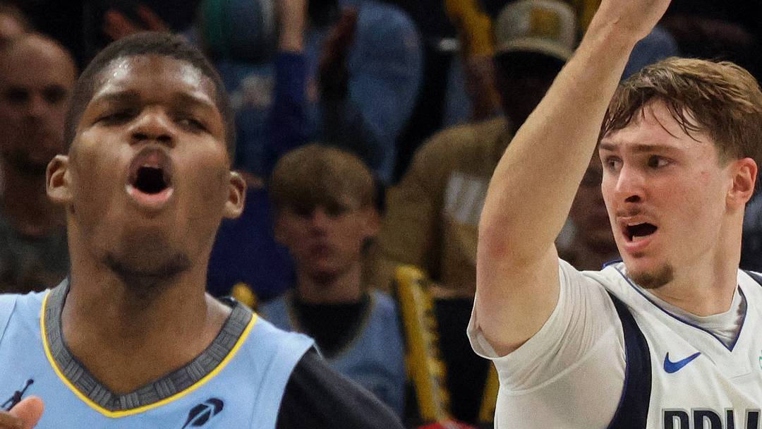Nov 7, 2025; Memphis, Tennessee, USA; Dallas Mavericks forward Cooper Flagg (32) and Memphis Grizzlies forward Cedric Coward (23) react during the second quarter against the Memphis Grizzlies at FedExForum. Mandatory Credit: Petre Thomas-Imagn Images