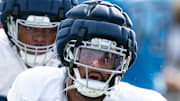 Tennessee Titans outside linebacker Dre'Mont Jones goes through drills during training camp.