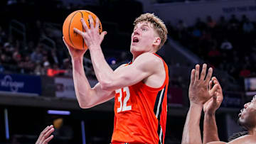 Illinois Fighting Illini guard Kasparas Jakucionis (32) goes up for a basket Friday, March 14, 2025, in a quarterfinals game at the 2025 TIAA Big Ten Men’s Basketball Tournament between the Maryland Terrapins and the Illinois Fighting Illini at Gainbridge Fieldhouse in Indianapolis. The Maryland Terrapins defeated the Illinois Fighting Illini, 88-65.