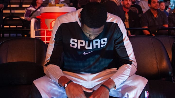 Mar 7, 2025; Sacramento, California, USA; San Antonio Spurs guard De'Aaron Fox (4) takes a moment on the bench before the game against the Sacramento Kings at Golden 1 Center. Mandatory Credit: Ed Szczepanski-Imagn Images