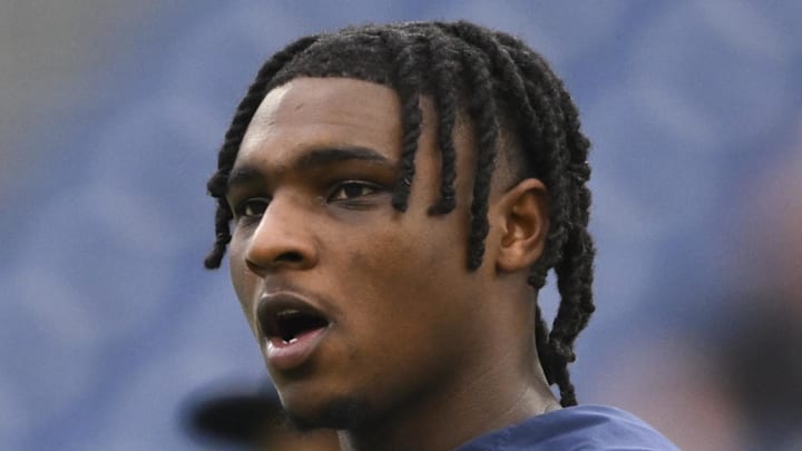  Dec 28, 2025; Nashville, Tennessee, USA;  Tennessee Titans quarterback Cam Ward (1) warms up prior to the game against the New Orleans Saints at Nissan Stadium. Mandatory Credit: Steve Roberts-Imagn Images