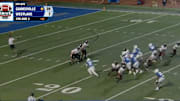 Punter Taz Smith, left, rescues a bad snap for Gainesville (Georgia) before running for a 78-yard touchdown.