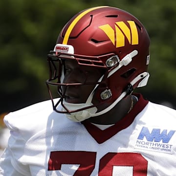 Jun 10, 2025; Ashburn, VA, USA; Washington Commanders offensive tackle Laremy Tunsil (78) stands on the field on day one of minicamp at Commanders Park. Mandatory Credit: Geoff Burke-Imagn Images