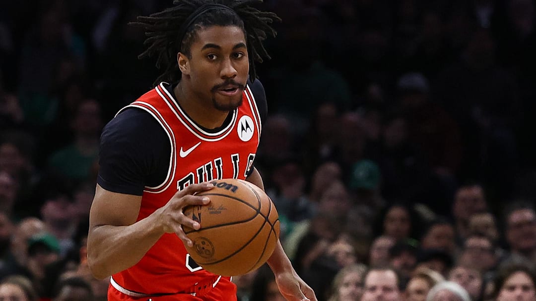 Feb 11, 2026; Boston, Massachusetts, USA; Chicago Bulls guard Jaden Ivey (31) brings the ball up the court against the Boston Celtics during the second half at TD Garden.