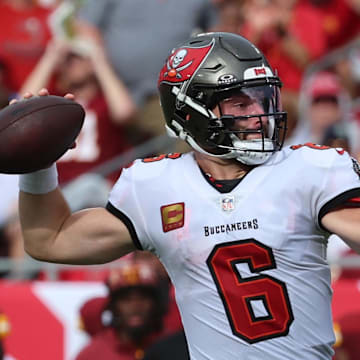 Sep 8, 2024; Tampa, Florida, USA;  Tampa Bay Buccaneers quarterback Baker Mayfield (6) throws the ball against the Washington Commanders during the first half at Raymond James Stadium. Mandatory Credit: Kim Klement Neitzel-Imagn Images