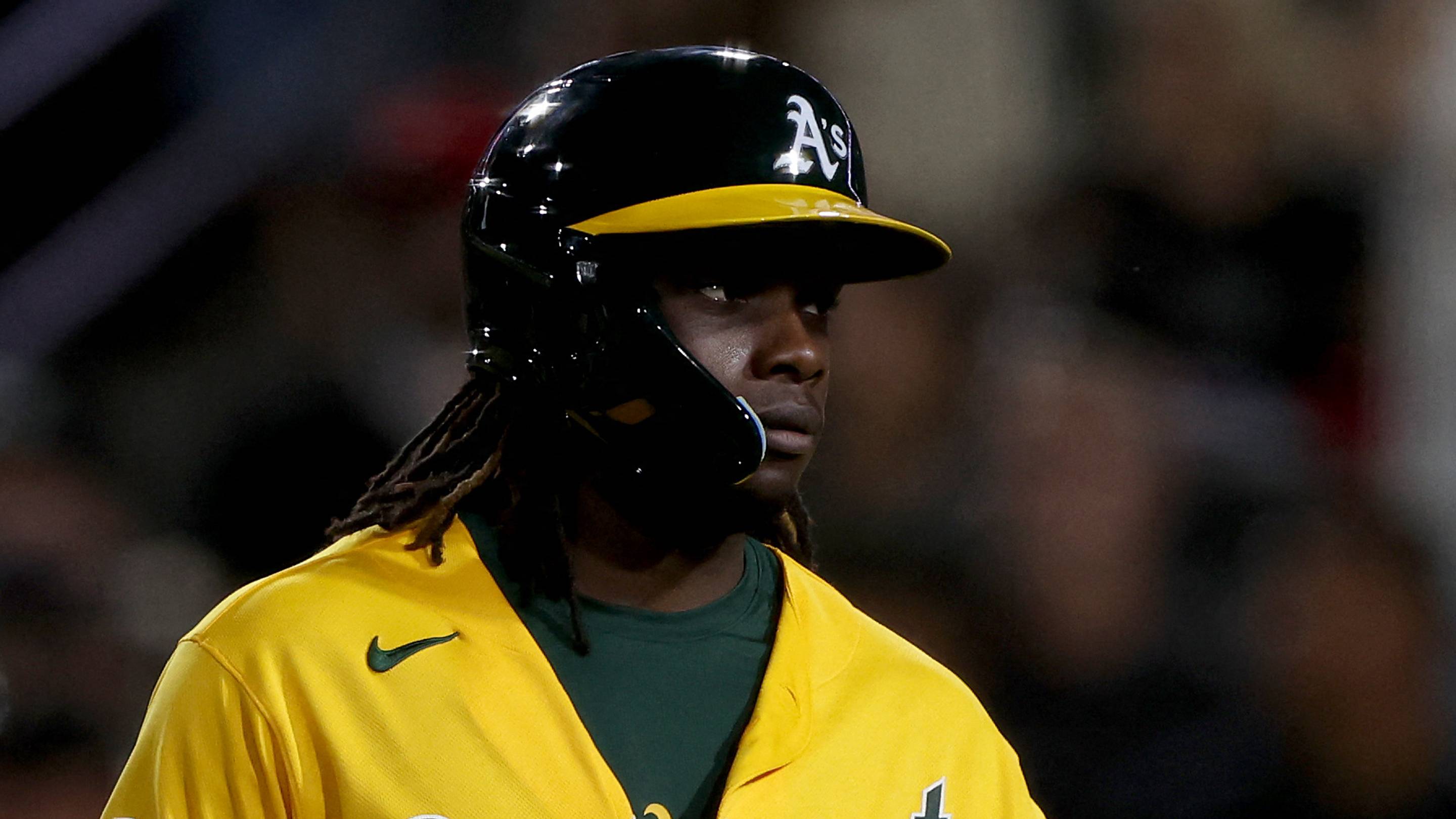 Sep 26, 2026; West Sacramento, California, USA; Athletics right fielder Lawrence Butler (4) walks towards the dugout after scoring a run against the Houston Astros during the fourth quarter at Sutter Health Park. Mandatory Credit: Dennis Lee-Imagn Images