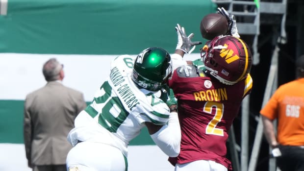 Washington Commanders receiver Dyami Brown brings in a pass from quarterback Jayden Daniels.