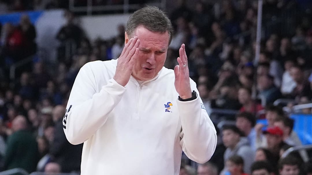 Mar 20, 2025; Providence, RI, USA;  Kansas Jayhawks head coach Bill Self reacts during the first half against the Arkansas Razorbacks at Amica Mutual Pavilion. Mandatory Credit: Gregory Fisher-Imagn Images