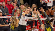 Nebraska middle blocker Andi Jackson attacks against Oregon.