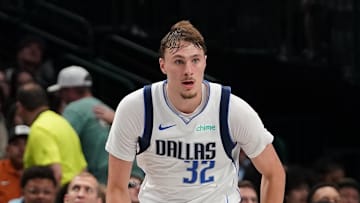 Oct 11, 2025; Dallas, Texas, USA; Dallas Mavericks forward Cooper Flagg (32) brings the ball up court against the Charlotte Hornets in the second half of a game at American Airlines Center. Mandatory Credit: Raymond Carlin III-Imagn Images
