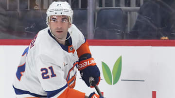 Mar 18, 2025; Pittsburgh, Pennsylvania, USA;  New York Islanders center Kyle Palmieri (21) skates with the puck against the Pittsburgh Penguins during the third period at PPG Paints Arena. Mandatory Credit: Charles LeClaire-Imagn Images