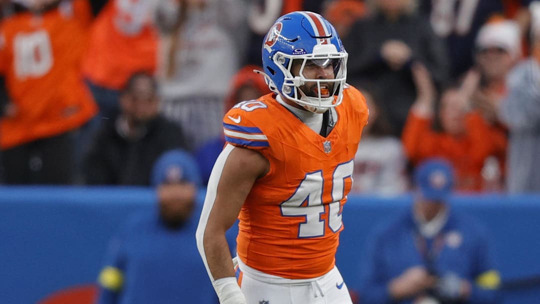 Jan 4, 2026; Denver, Colorado, USA; Denver Broncos linebacker Justin Strnad (40) celebrates after a sack during the second half against the Los Angeles Chargers at Empower Field at Mile High. Mandatory Credit: Isaiah J. Downing-Imagn Images