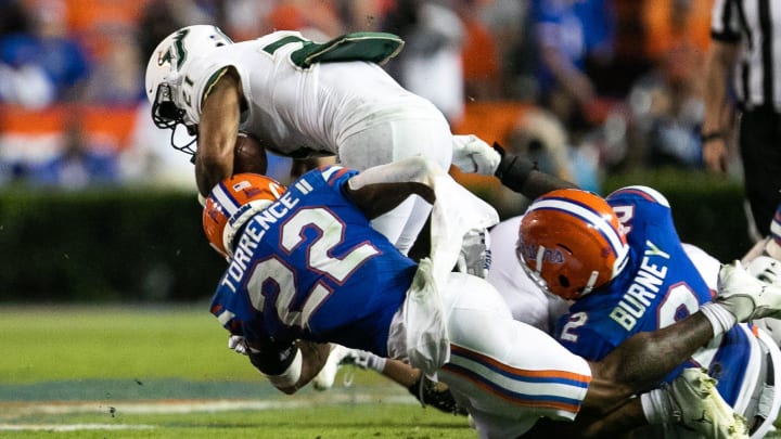 Florida Gators safety Rashad Torrence II (22) brings down South Florida Bulls running back Brian Battie (21) at Steve Spurrier Field at Ben Hill Griffin Stadium in Gainesville, FL on Saturday, September 17, 2022. [Cyndi Chambers/Gainesville Sun]

Ncaa Football Florida Gators Vs Usf Bulls