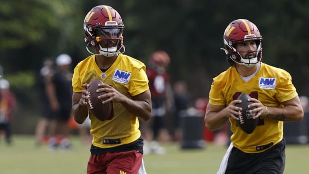 Washington Commanders quarterback Jayden Daniels and Sam Hartman.