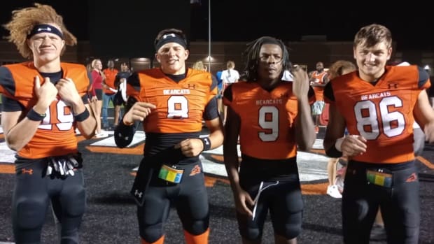 Raycine Guillory (No. 9) gives a postgame interview with Aledo teammates on Sept. 8, 2023.