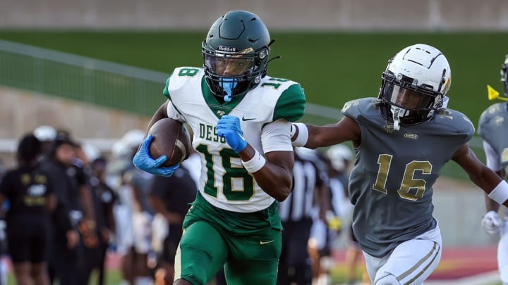 DeSoto receiver Ethan Feaster runs after catching a pass during a 2023 game against South Oak Cliff. | Photo by Robbie Rakestraw