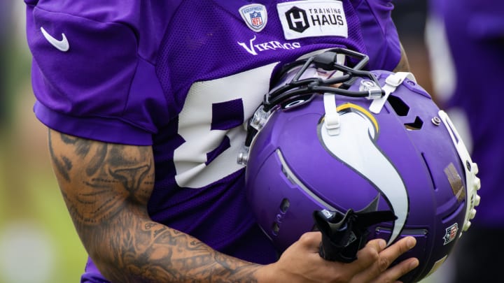 Jalen Nailor holding his helmet during a Vikings OTA practice. 