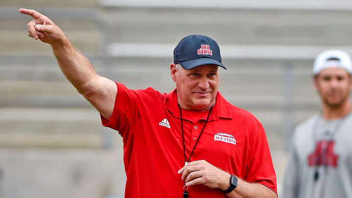 Jacksonville State Head Coach Rich Rodriguez points to the locker room during a weather delay in the Jax State Spring game in Jacksonville, Alabama. April 19, 2024.