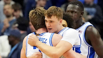 Mar 29, 2025; Newark, NJ, USA; Duke Blue Devils forward Cooper Flagg (2) celebrates with guard Kon Knueppel (7) after a play during the first half against the Alabama Crimson Tide in the East Regional final of the 2025 NCAA tournament at Prudential Center. Mandatory Credit: Robert Deutsch-Imagn Images