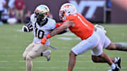 Oct 4, 2025; Blacksburg, Va.; Virginia Tech safety Tyson Flowers (11) defends Wake Forest wide receiver Chris Barnes (10).