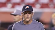 Utah Utes head coach Kyle Whittingham watches warm ups before a game against the Arizona Wildcats at Rice-Eccles Stadium.
